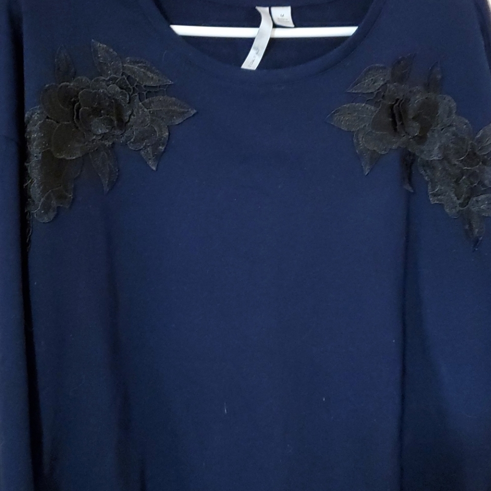 Lauren Conrad Medium navy sweater, black flower appliqué, ruffle sleeves